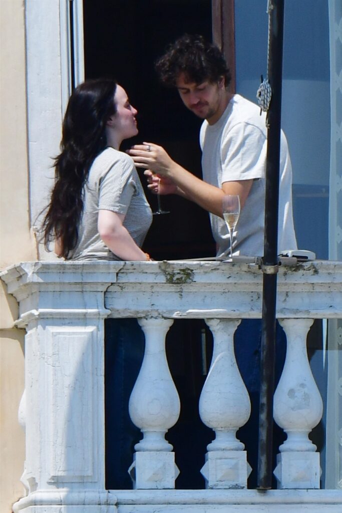 Billie Eilish, Nat Wolff, Hollywood romance, celebrity couple, Paris, balcony kiss, relationship confirmation, entertainment news, music, acting, love story