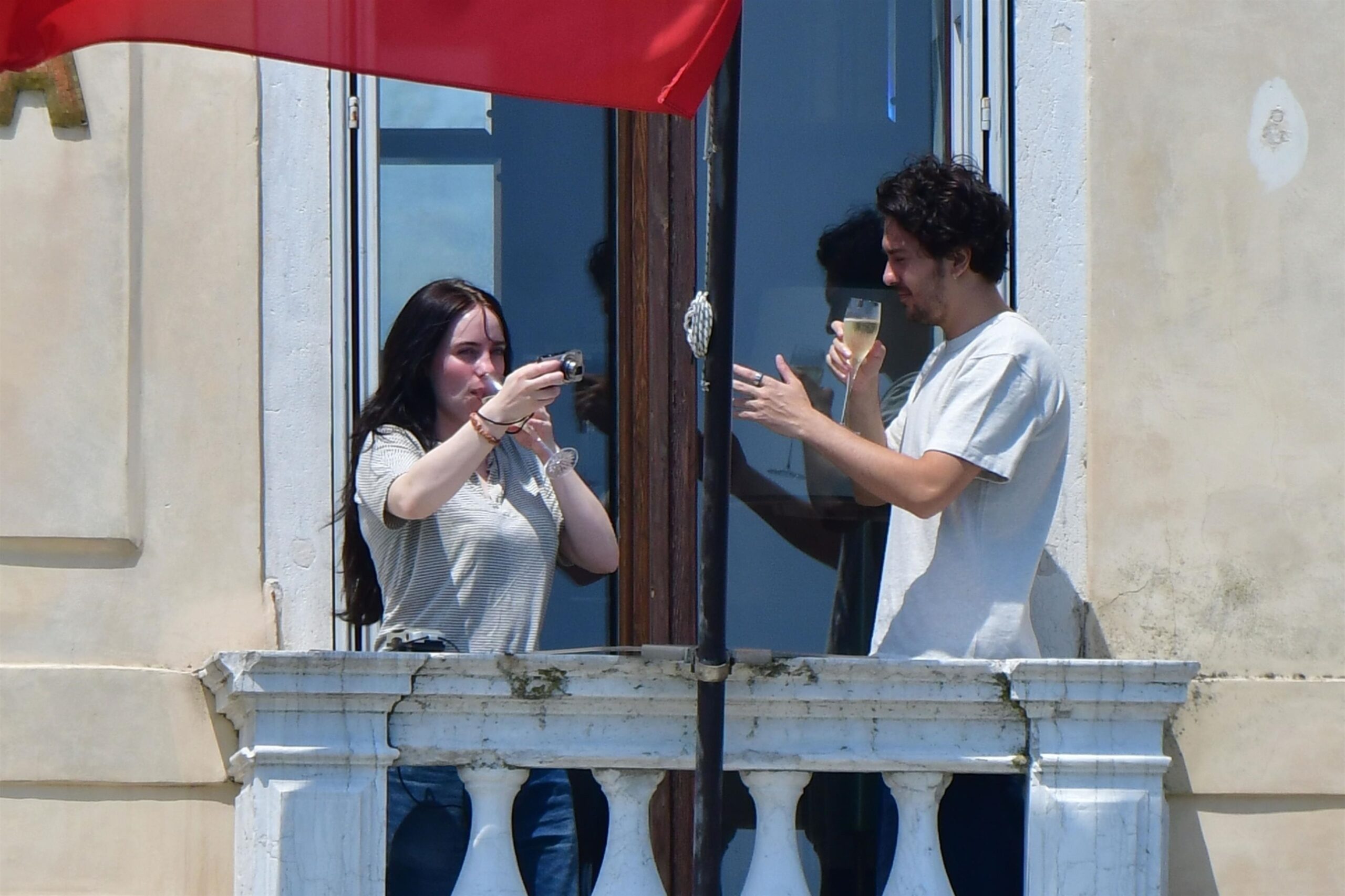 Billie Eilish and Nat Wolff Go Public With Romantic Balcony Kiss